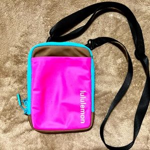 LULULEMON EASY ACCESS BAG. WORN ONCE. POPULAR PINK.